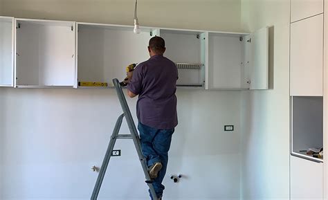 hanging wall cabinets on steel studs|mounting kitchen cabinets to wall.